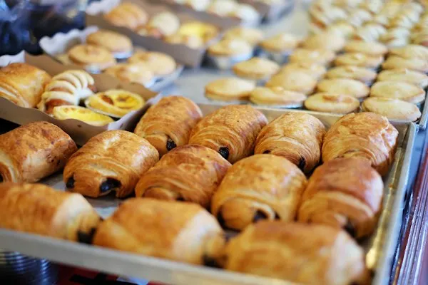 A tray of croissants and pains au chocolat