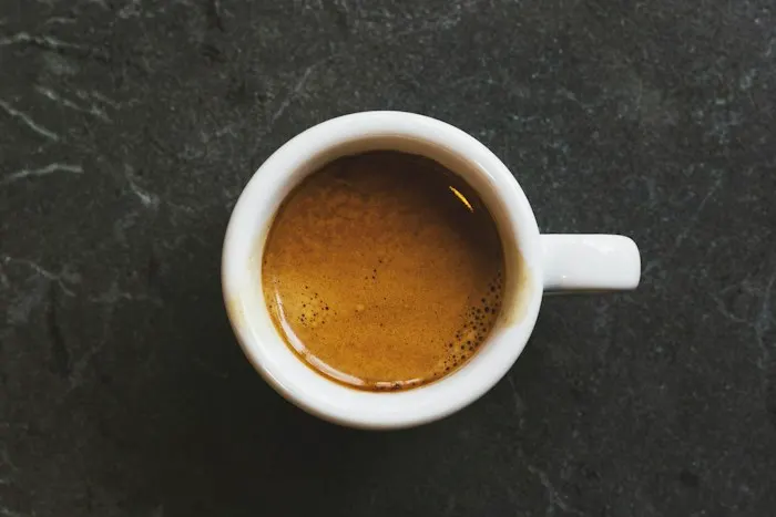 An espresso in a white cup